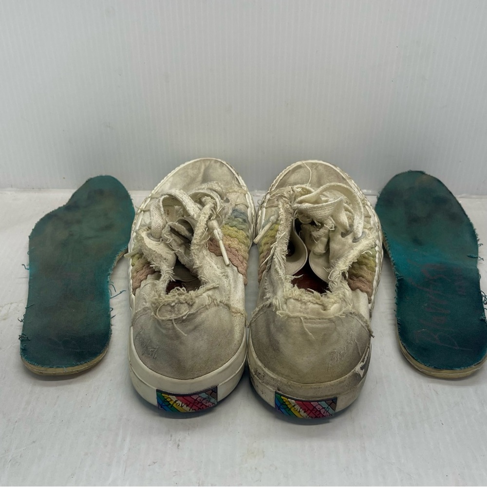 Bundle of Shoes and New Pair of Socks